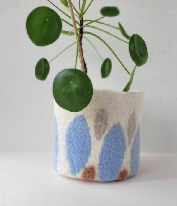 Cache pot à feuilles bleues