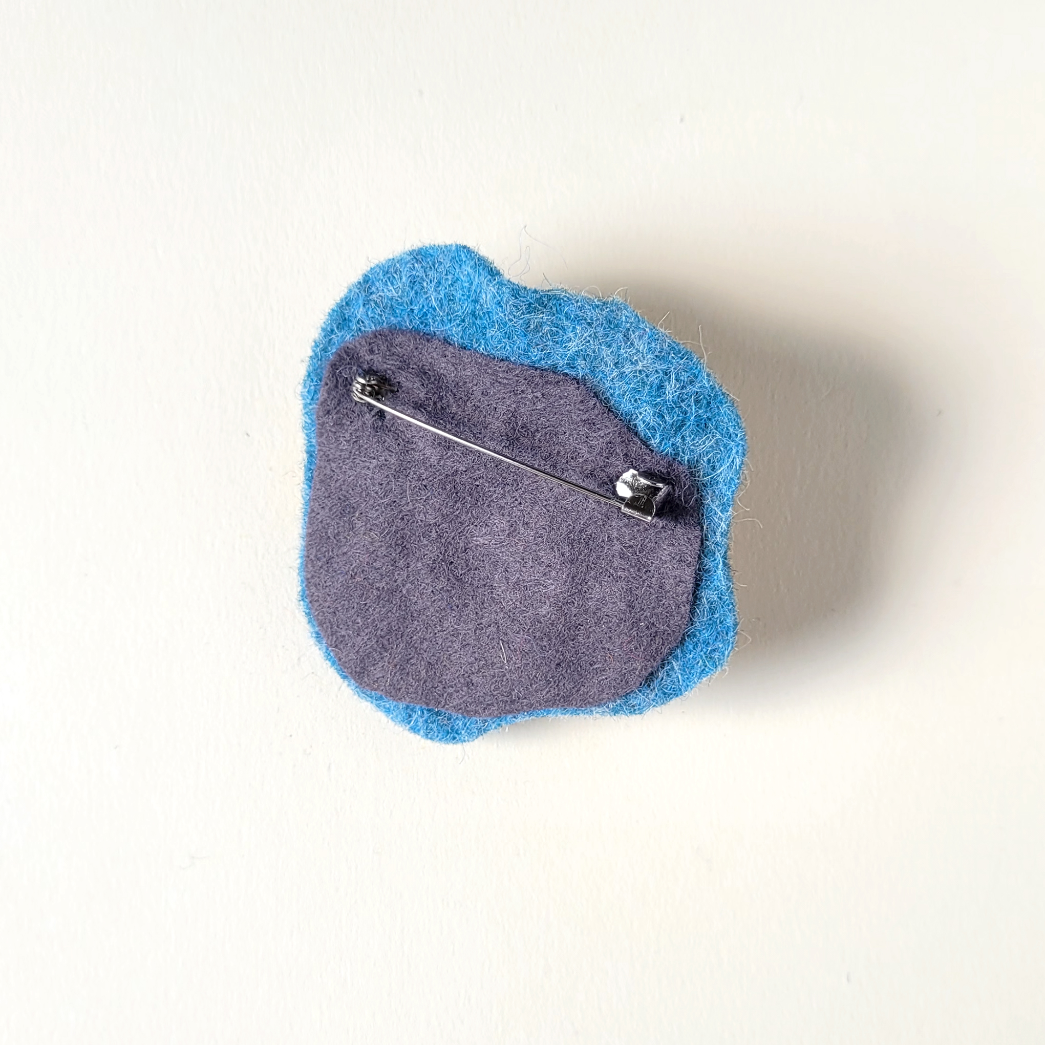 Poppie - broche bleu-ocre